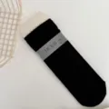 Chaussettes noires en tricot pour femme avec revers et emballage, style simple et chic. - Noir