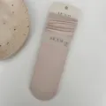 Chaussettes mi-mollet côtelées beiges avec étiquette et bande, chaussettes respirantes. - Blanc Cassé
