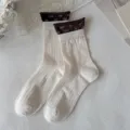 Chaussettes côtelées pour femmes beige avec revers à nœud chaussettes mignonnes tricot - Bord Festonné