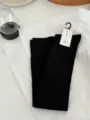 Chaussettes hautes noires avec étiquette de marque, chaussettes longues en coton doux. - Taille unique / Noir