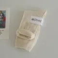 Calze a metà gamba a coste unite minimaliste con etichetta in carta per ogni giorno. - Taglia unica / Albicocca chiaro