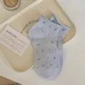 Light blue floral short socks for women, spring summer breathable mesh rolled cuff design. - One Size / Blue