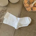 Chaussettes blanches classiques mi-hautes, style simple uni, vêtement de printemps. - Taille unique / Blanc