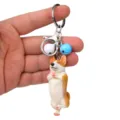 Süßer Yoga Corgi Schlüsselanhänger mit Glocken Metallring Autoschlüssel Tasche Anhänger - Einbeiniger Yoga-Corgi / Blau Weiß