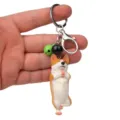 Nahaufnahme des niedlichen Yoga Corgi Schlüsselanhängers mit Glocke für Taschen Autos. - Einbeiniger Yoga-Corgi / Grün-Schwarz