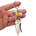 Niedlicher Yoga Hund Schlüsselanhänger mit Metallring, Karabiner und Glocken. Tolle Taschendeko. - Einbeiniger Stand Husky / Weiß Gelb