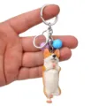 Niedlicher Yoga Corgi Hund Schlüsselanhänger mit farbigen Glocken als stilvoller Taschenanhänger. - Einbeiniger Yoga-Corgi / Lila Blau