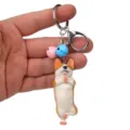 Yoga Corgi Schlüsselanhänger mit Hundefigur, bunten Glöckchen und Metallkarabiner für Tasche. - Einbeiniger Yoga-Corgi / Hellblau