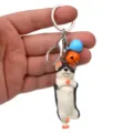 Niedlicher Yoga-Hund Schlüsselanhänger mit bunten Glocken und Karabiner für Autos und Taschen. - Einbeiniger Stand Husky / Orange Blau