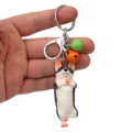 Süßer Yoga-Hund-Schlüsselanhänger mit bunten Glöckchen und stabilem Karabiner für den Alltag. - Einbeiniger Stand Husky / Grün Orange