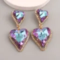 Detail of elegant heart-shaped earrings with purple gradient crystal facets. - Purple Multi-color