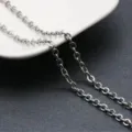 Close up detail of silver titanium steel o-chain necklace, smooth links and metallic shine. - Chain Only (Rolo Chain/Without Pendant) / Silver