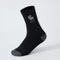 Detailed close-up of a black winter thermal loop sock featuring a knitted sheep pattern. - One Size / Black