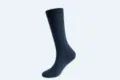 Detailed view of solid dark blue men's long dress socks, soft knit texture for autumn. - L / Solid Navy