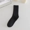 Women solid color slouch socks mid-high tube long socks black variant winter casual wear - One Size / Black