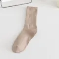 Solid color ribbed crew socks for women, comfortable daily casual wear in nude color variant. - One Size / Nude