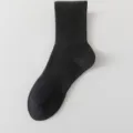 Calzini a metà polpaccio neri tinta unita classici per uomo e donna, calze sportive traspiranti. - Taglia unica / Calzini al ginocchio / Nero