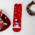 Festive Christmas mid-calf socks featuring cute snowman and snowflake patterns in red. - Color 013