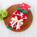 Close-up detail of thickened coral fleece Christmas socks with bow and festive header card. - One Size / Bowknot Reindeer