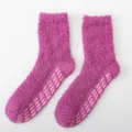 Cozy pink fuzzy slipper socks with non-slip grips, soft coral fleece for warm home comfort. - Women's Non-slip Solid Purplish Red