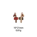 Détail en gros plan du pendentif de canne de Noël en alliage émaillé et finition dorée fine. - Canne en Sucre de Noël