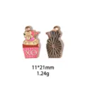 Vue détaillée du pendentif cupcake en alliage, émail recto, dos texturé, taille 11x21mm. - Licorne & Bonbons