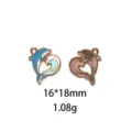 Vue détaillée et rapprochée du pendentif en alliage dauphin et vague émaillé avec dimensions. - #19-Dauphin