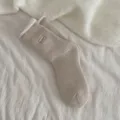 Gemütliche dicke gefütterte Thermosocken in neutralem Beige, ideal für kalte Wintertage im Haus. - 35-38 / Khaki