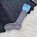 Chaussettes empilées côtelées bicolores de style coréen, variante élégante et contrastée. - Taille unique / Gris