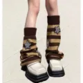 Knit striped leg warmers with shiny star embroidery, perfect for stylish autumn wear. - Coffee Striped Stars