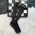 Schwarze gerippte Kniehohe Socken mit süßer Satinschleife, modische süße Beinwärmer für den Alltag. - Unabhängige OPP-Beutelverpackung / Schwarz Wadenlange Socken