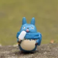 Cute blue cartoon figurine miniature detail view, perfect for micro landscape and DIY gardening. - Blue Dragon Eating Ice Cream (珍 E8-4)