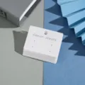 White paper earring display cards with multi-holes for jewelry packaging and retail use. - 5.5x4cm 4 Holes
