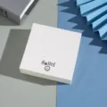 White paper earring cards for jewelry display, multi-hole stud cards with cute smiley design. - 8*8cm (8 Holes)