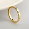 Minimalist gold titanium steel ring with paved cubic zirconia, delicate stackable band. - Gold with 3 Drills