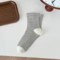 Cute black and white striped socks for women with pearl details, cozy winter knit socks. - One Size / Black and White
