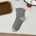 Grey striped women's socks with elegant pearl cuff details, comfortable daily casual wear. - One Size / Gray