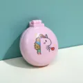 Primo piano di specchio tascabile pieghevole rosa con pettine e unicorno - Stile Mostro / Rosa