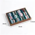 Walnut wood grain 12-slot jewelry display tray with green velvet pillows for bracelets and necklaces. - Walnut 12-Slot Display Tray / Green