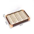 Plateau de rangement bijoux en noyer 40 fentes avec coin dore affichage bracelet boite. - Coins Arrondis Dorés Cadre Noyer 40 Fentes Doublure Beige