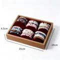 Wooden jewelry display tray with 6 red velvet pillows and colorful beaded bracelets for shop. - Walnut 6-Slot Display Tray / Coffee