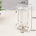 Clear acrylic necklace display box with dustproof door, rotating hooks and velvet tray. - Acrylic Necklace Box with Velvet Tray