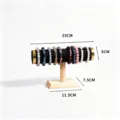 Wooden jewelry display stand with black velvet T-bar and natural wood base for bracelets. - Single Tier Bracelet Rack with Gold Cap / Black