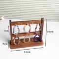 Wooden jewelry display stand with hooks, perfect for organizing bracelets and small accessories. - Walnut Color (10 Hooks) Display Stand