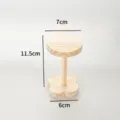 Wooden display stand for jewelry and action figures, natural wood finish, compact size. - Natural Wood Flower Shape Stand