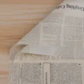 Vintage English newspaper bouquet wrapping paper, waterproof floral gift packing material sheet. - 20 Pieces/Pack (56x56cm) / Kraft Paper with Black Letters