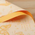 Waterproof floral wrapping paper for flower bouquets, printed with cute butterflies and stars. - Goose Yellow