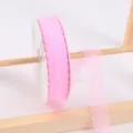 Pink lace ribbon roll for flower bouquet and gift wrapping, delicate floral lace trim for crafts. - Pink