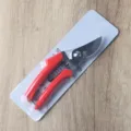 Professionelle Gartenschere mit ergonomischen roten Griffen und rostfreien Klingen. - Gartenschere / Rot