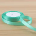 1cm green satin ribbon roll for gift wrapping, flower bouquet packaging and craft bows. - Tiffany Blue